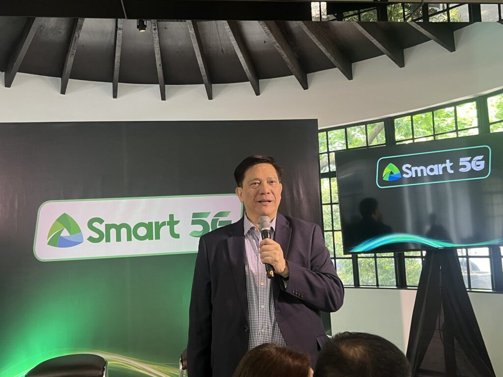 Smart ZTE Blade A75 5G officially launches in PH 2 a person guest speaker holding a mic about live event of smart zte blade a75 5g.