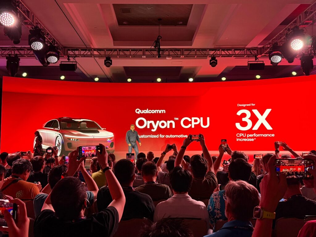 a peoples and a person on the stage representing the oryon cpu with arm qualcomm lawsuit