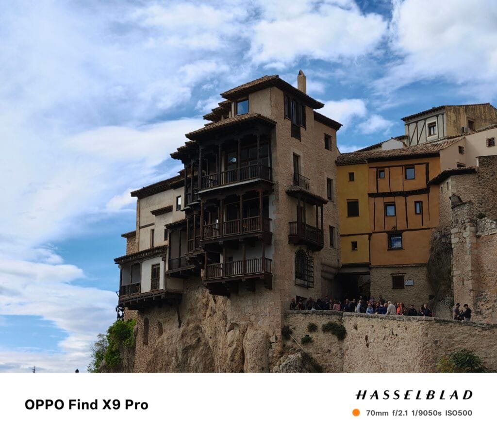 Oppo Find X9 Series Global Launch Set for October 28, 2025, in Barcelona, Spain 3 Oppo Find X9 Pro camera sample: Ancient buildings with wooden balconies on a rocky cliff under a cloudy sky.