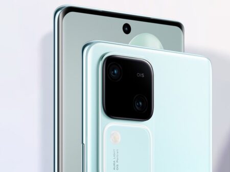 A close-up view of a light blue smartphone with a glossy surface and a dual camera with OIS on the back panel.