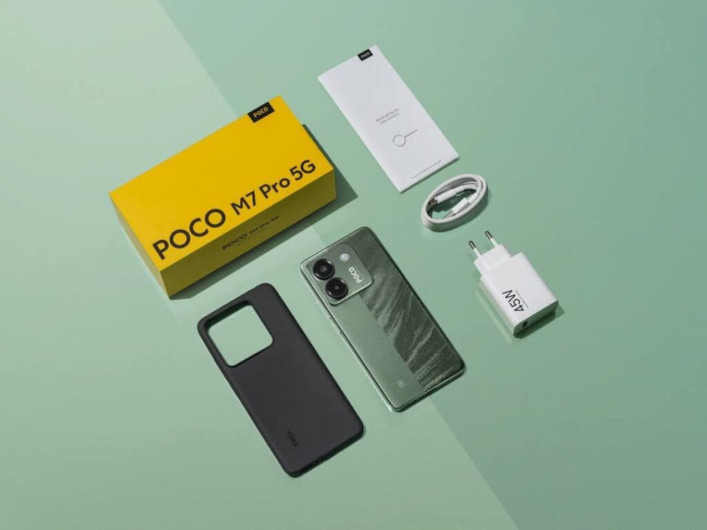 Poco M7 Pro 5G with Mediatek Dimensity 7025 Ultra Arrived in the PH 1 Flatlay image of a Poco M7 Pro 5G unboxing. A green Poco M7 Pro 5G phone is displayed alongside its yellow box, a black phone case, a white USB-C cable, and a white 45W charger. Instruction manuals are also visible.