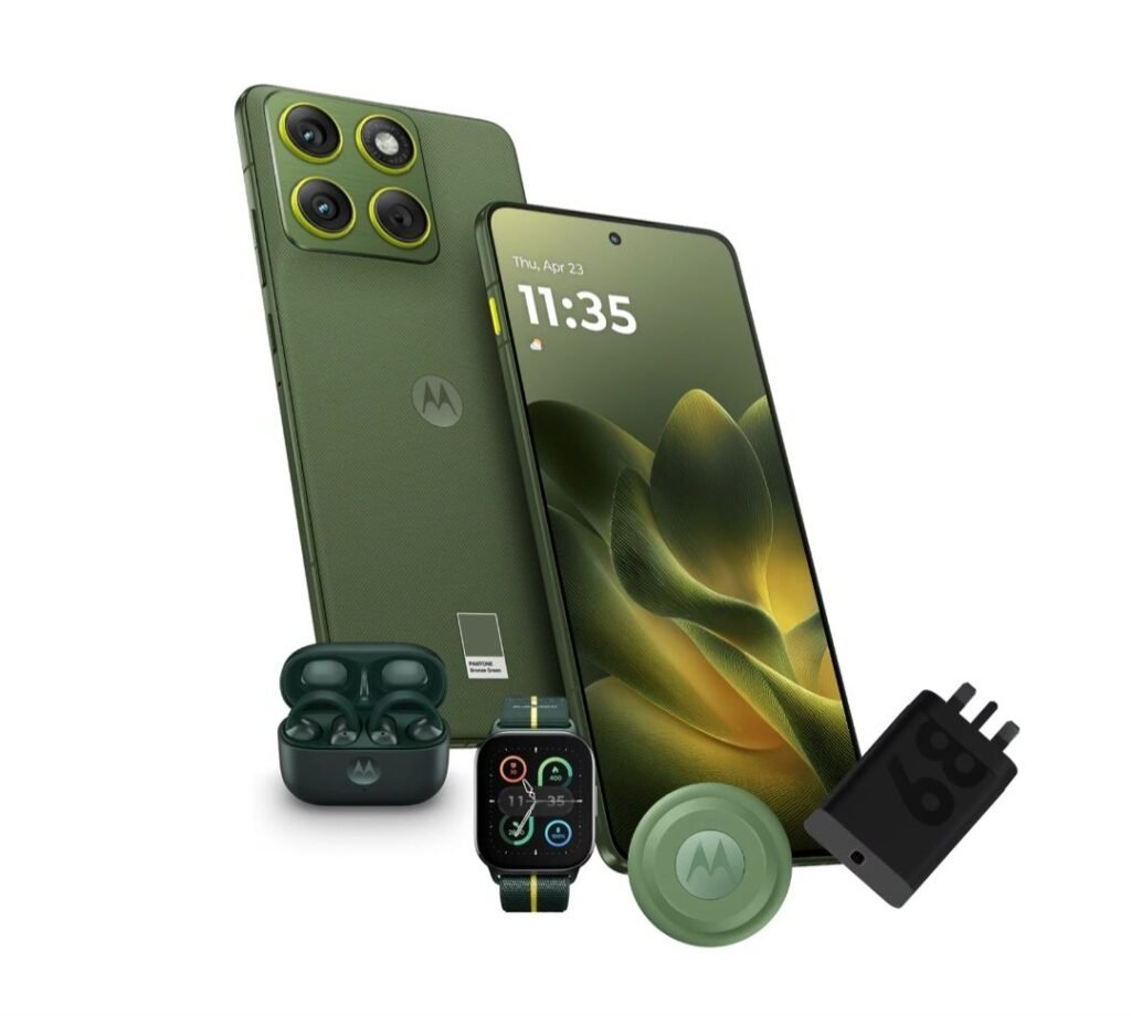 Motorola Edge 70 Launching in India on December 15: SD 7 Gen 4, IP69 Rating, and Larger Battery 1 Motorola Edge 70 smartphone in Pantone Bronze Green, showcasing its quad-camera setup, accompanied by matching earbuds, smartwatch, and charging adapter.