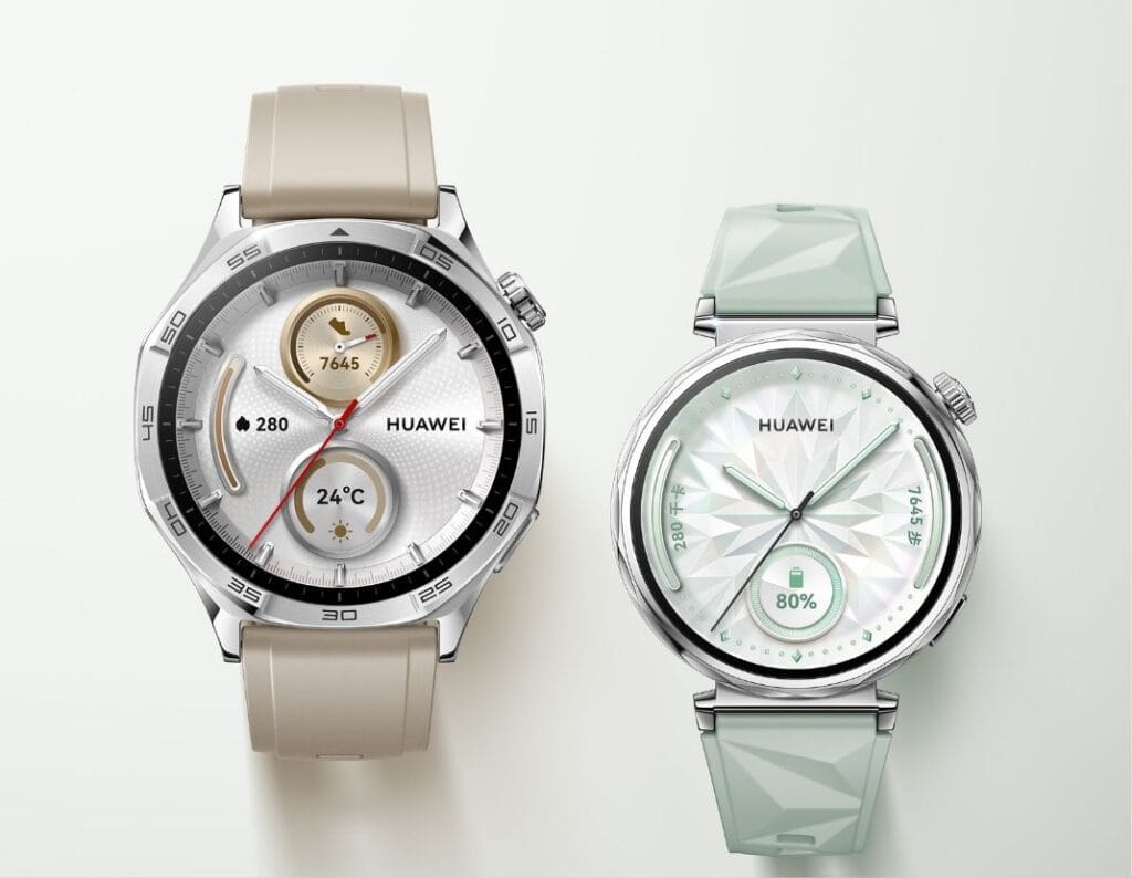 Huawei Watch GT6 Series Tipped for Launch in September or October 1 Close-up product shot showcasing two Huawei Watch GT5 smartwatches. The watch on the left features a beige silicone band and a classic watch face. The watch on the right has a light green, textured band and a more modern, geometric watch face.