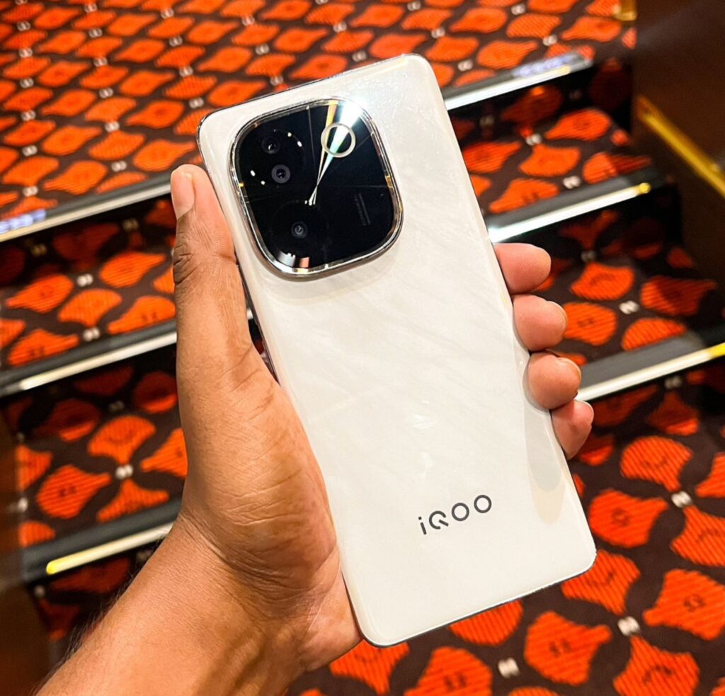 a person holding a smartphone iqoo z9s pro