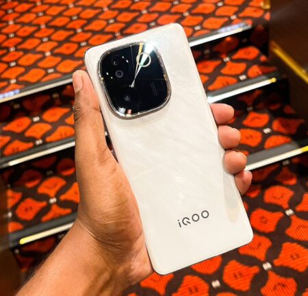 a person holding the iqoo z9s pro