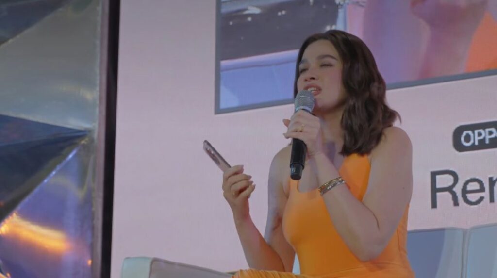 a person speaker bea alonzo on launch event of oppo reno 12f 5g in sm city dasmariñas