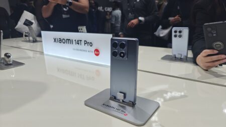 a smartphone xiaomi 14t series placed in phone stand at xiaomi store