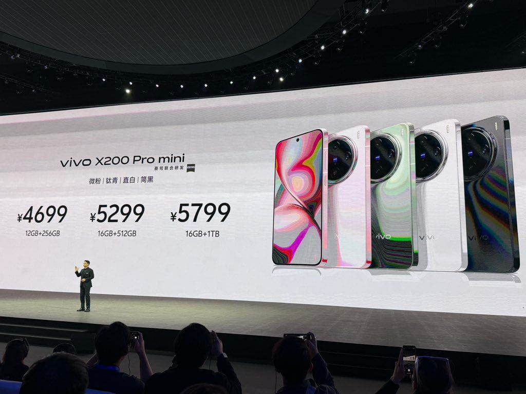 Vivo X200 Series with Powerful MediaTek Dimensity 9400: Price, Features, and Availability 6 a person in a stage event presenting the features and price of the vivo x200 pro mini