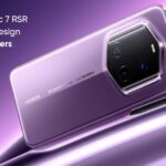 A close-up image of the back of a purple Honor Magic 7 RSR Porsche Design smartphone. The phone is resting on a purple surface, and the camera module is prominently displayed. The camera module is a hexagonal shape with three lenses and a flash. The phone's branding, "Honor Porsche Design," is visible on the back.