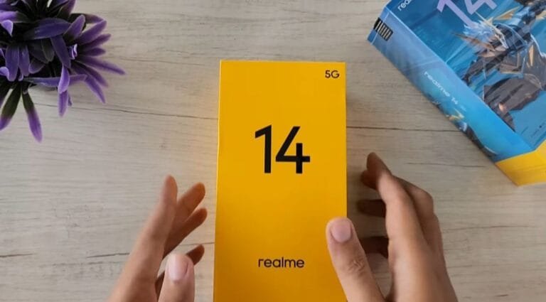 A yellow Realme 14 5G phone box with the number 14 prominently displayed.