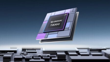 A close-up, digitally rendered image showcases the Unisoc T8300 5G system-on-a-chip (SoC). The SoC is depicted as a layered, rectangular chip with a dark gray surface and accents of purple and light blue. The Unisoc logo and "T8300" are clearly visible on the chip's surface. The chip hovers above a detailed circuit board, suggesting its integration into a larger electronic system. The background is a gradient of dark blue, providing a clean and professional aesthetic.