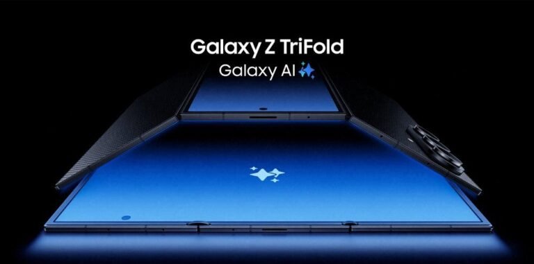 Image of the Samsung Galaxy Z TriFold partially unfolded, displaying its large blue screen and carbon fiber-like texture on the outer panels. The 'Galaxy AI' logo is visible on the screen.
