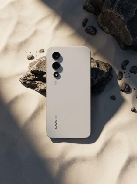 Back view of the Lava Play Max smartphone in Himalayan White, showcasing the triple camera setup.
