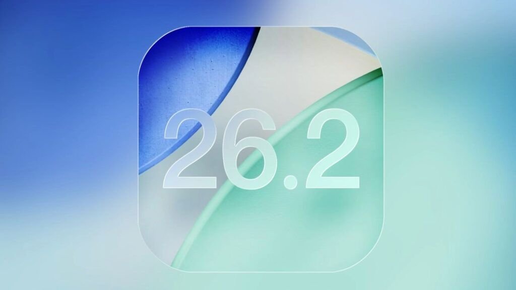 iOS 26.2 Stable Update Starts Rolling Out! What's New? 1 Image of the iOS 26.2 update icon, featuring a frosted glass effect over a blue and green swirl design.