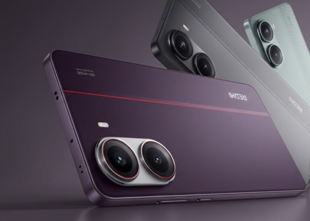 Product render of the Redmi Turbo 5 Pro smartphone, showcasing three color variants. In the foreground is a deep purple model with a textured back, a thin red accent line, and a dual-camera module with silver rings and red trim. Behind it are a matte gray variant and a light teal variant, both featuring the same dual-camera design. The 'REDMI' logo and '5G' text are visible on the purple model’s back.