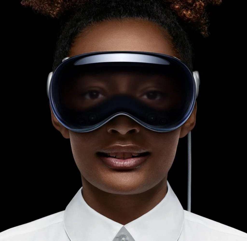 A person wearing Apple Vision Pro, a spatial computer that blends digital content with the physical world.