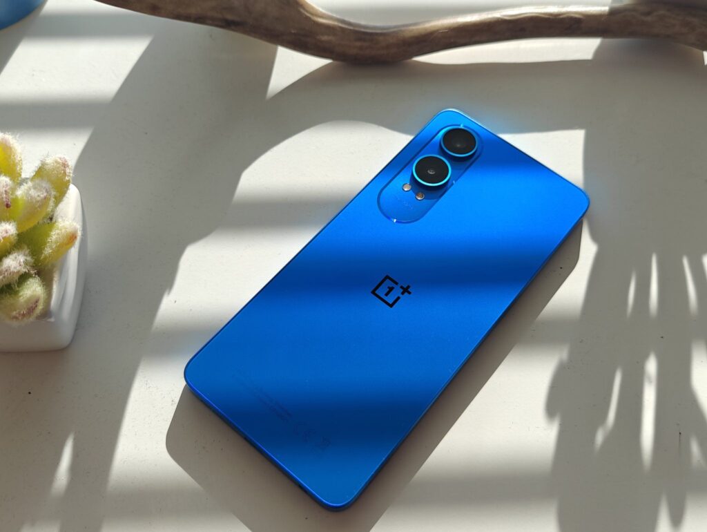 A Smartphone Oneplus Nord Ce4 Lite 5G Features Vibrant Blue Color