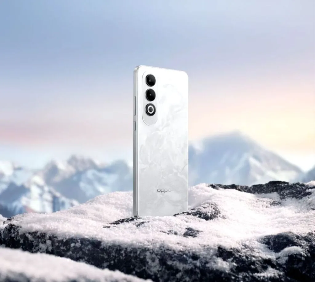 Oppo K12 Plus: A New Mid-Range Smartphone with Impressive Features and Price 5 a phone oppo k12 plus features triple camera setup and led flash at the back panel eith blur mountain bacground.