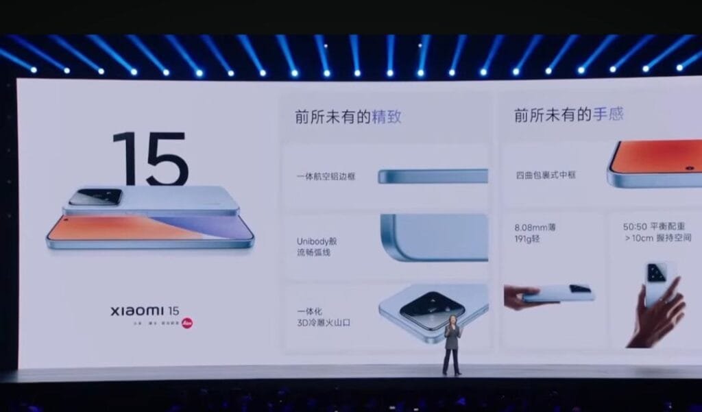 a person standing in the stage, presenting the launch of xiaomi 15 series.