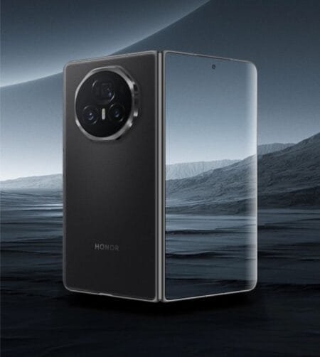 The Honor Magic V3 5G has officially launched in the Philippines, priced at P89,999 A dark gray Honor Magic V3 5G phone is shown slightly angled, partially open, revealing its screen displaying a minimalist landscape. The phone's circular camera array is visible on the back.
