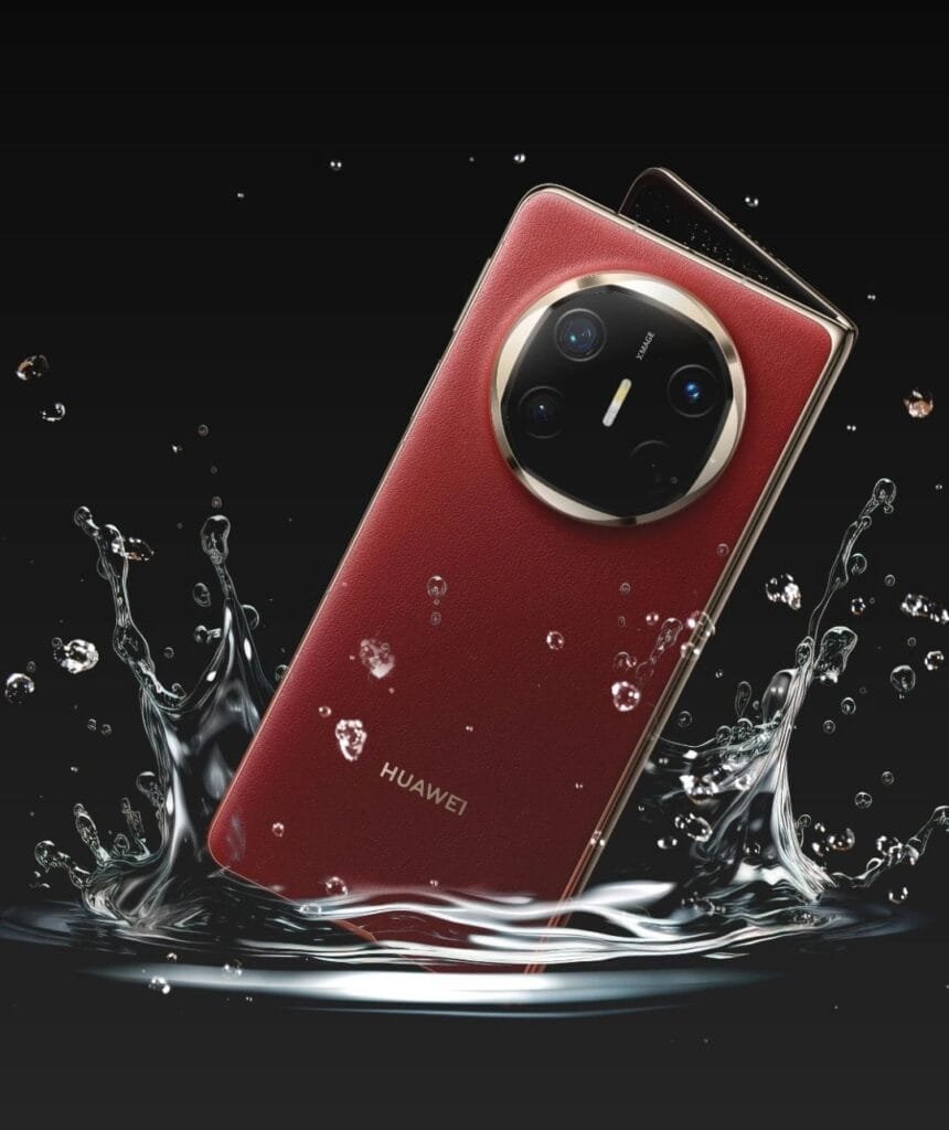 Huawei Mate X6 Price in the Philippines, Specs, and Features 2 A red Huawei Mate X6 foldable phone is partially submerged in water, creating a splash. The phone's distinctive circular camera module and gold accents are visible. The image suggests the phone's durability and possibly water-resistant capabilities.