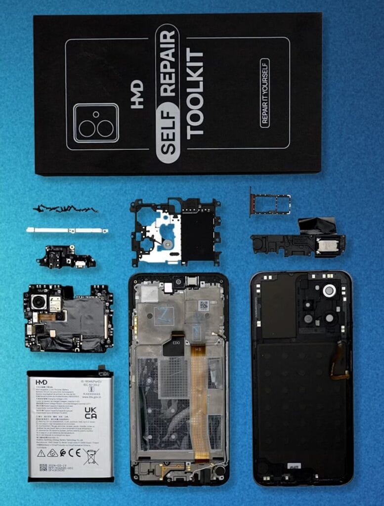 HMD Crest 5G Arrives in the Philippines with Unisoc T760 5G Processor 2 A flatlay image shows the components of the HMD Crest 5G self-repair kit. The kit includes the phone's disassembled parts (battery, motherboard, screen, etc.), a SIM tray, and a black box labeled "Self Repair Toolkit".