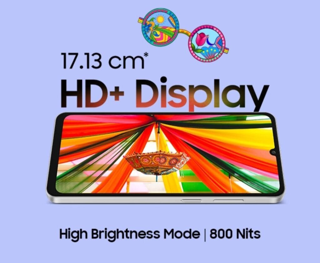 Samsung Galaxy F06 Confirmed to Launch in India on February 12th, 2025 2 A promotional image showcasing the Samsung Galaxy F06's 17.13 cm HD+ display. The phone is shown angled, displaying a vibrant image of colorful fabric draping from a ceiling. Text highlights the display size and its high brightness mode (800 nits). A pair of stylized sunglasses is included in the graphic design.
