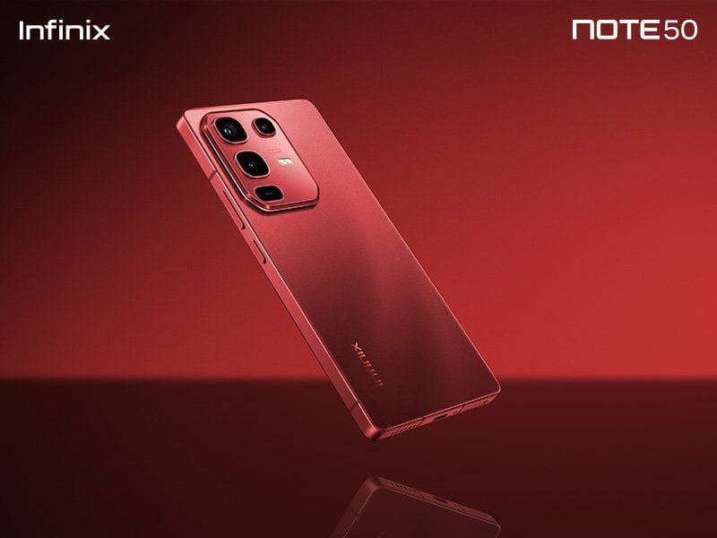Infinix Note 50 Series Confirmed to Launch on March 3, 2025 3 A red Infinix Note 50 smartphone is shown hovering above a reflective surface against a red background. The phone's camera module is visible.