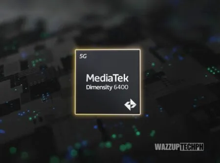 Mediatek Dimensity 6400 Officially Launched: Clocked at 2.5GHz Cortex A76 Close-up view of a MediaTek Dimensity 6400 chip, depicted as a dark rectangular component with the MediaTek logo and 'Dimensity 6400' text prominently displayed. The chip is subtly highlighted with a golden glow. The background is blurred, showing a circuit board with glowing green and blue points, suggesting a technological context. The watermark 'WAZZUPTECHPH' is visible in the bottom right corner.