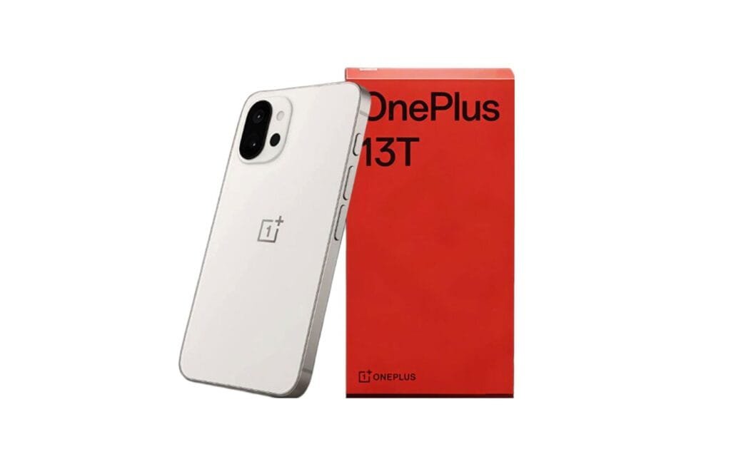 OnePlus 13T Launch Date: 6.3″ 1.5K OLED Display and Powerful Snapdragon 8 Elite A white OnePlus 13T smartphone is displayed alongside its signature red box. The phone's camera system is partially visible.