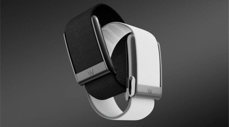Two Whoop 5.0 wearable fitness trackers shown, one with a black band and one with a white band. Both feature a dark gray metallic clasp with the Whoop logo.