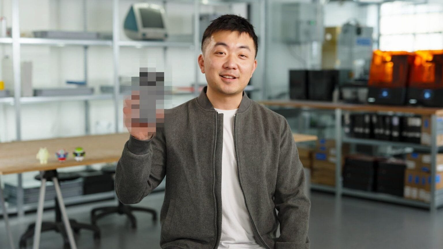 The Nothing Phone 3 is Set to Launch in India with Premium Materials, and Major Performance Upgrades Carl Pei, CEO of Nothing, smiles and holds up a partially pixelated image of the Nothing Phone 3.