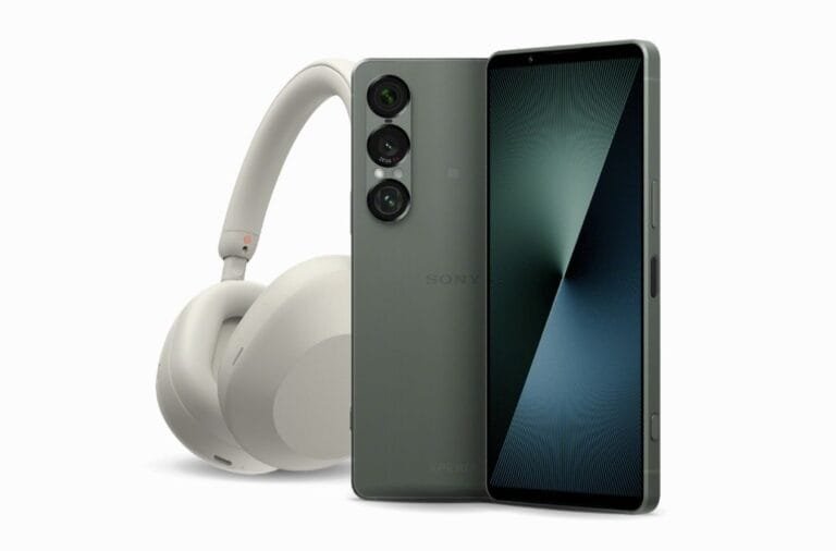 Product shot of the Sony Xperia 1 VII smartphone in a muted green color. The phone is displayed alongside a light beige pair of Sony wireless headphones, showcasing a sleek design aesthetic.