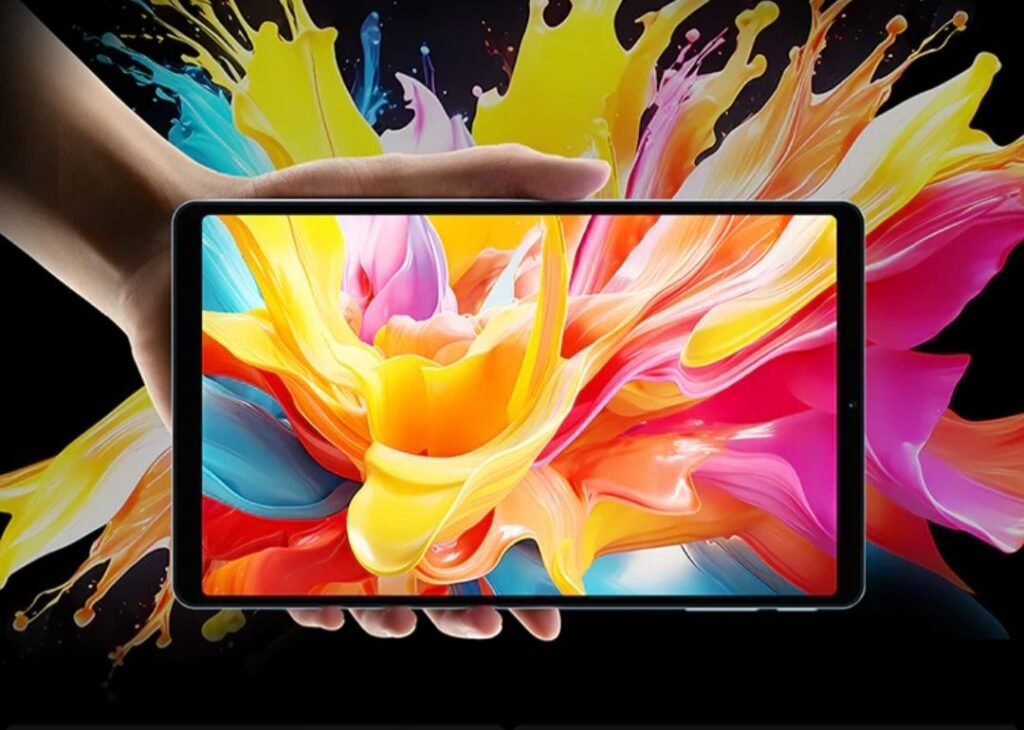 Teclast Unveils the T50 Mini: A Pocket-Sized Tablet with Mediatek Helio G99 Close-up of a person's hand displaying the Teclast T50 Mini tablet. The screen shows a colorful abstract image of swirling paint, highlighting the tablet's bright and vivid display.