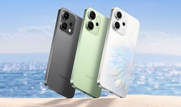 Oppo Reno 14 Global Launch in Japan | 6.59″ OLED Display, Dimensity 8350, and 50MP Sony LYT600 Camera Three Oppo Reno 14 5G smartphones displayed on a sandy beach near the ocean. The phones are shown in gray, light green, and a pearlescent white with a wavy design.