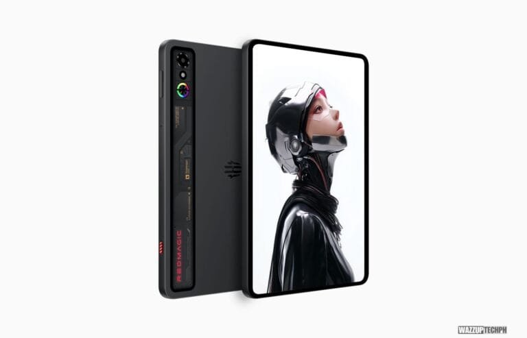 A promotional image of the REDMAGIC Gaming Tablet 3 Pro. The tablet is shown from the side and back, highlighting its slim profile, rear camera module, and a striking image on the display.