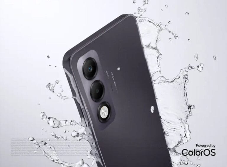 Oppo A5i Pro | Snapdragon 6s 4G Gen 1, IP65 Rating, and 6,000mAh Battery Close-up of the back of a dark purple Oppo A5i Pro smartphone partially submerged in splashing water, highlighting its water resistance and sleek design. The phone's triple-lens camera system is visible. l The text "Powered by ColorOS" is visible in the bottom right corner.