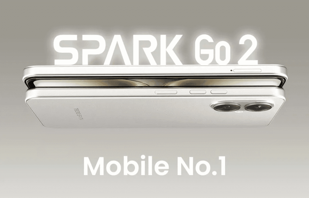 Tecno Spark Go 2 Specs: 6.67″ HD+ IPS LCD, Unisoc T7250, and IP64 Rating A silver Tecno Spark Go 2 smartphone is shown, slightly angled, with the brand name prominently displayed above.