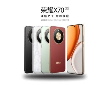 Honor X70 Launched in China with a Massive 8,300mAh Battery A promotional image showcasing the Honor X70 smartphone in four color options: black, white marble, light green, and burgundy. The phone features a distinctive circular camera module. The text overlay is in Chinese, highlighting key features like its large battery and durability.