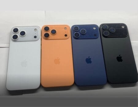 iPhone 17 Pro | New A19 Pro Chip, and Triple 48MP Cameras A lineup of iPhone 17 Pro dummy models in various colors, including white, orange, blue, and black. The image highlights the distinctive horizontal camera arrangement on the rear.