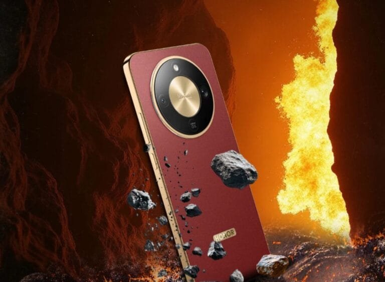 Honor X9d Launching on September 24, 2025, in Malaysia Close-up of the Honor X9d phone showcasing its circular camera module and textured red back, floating amidst volcanic rocks and flames.