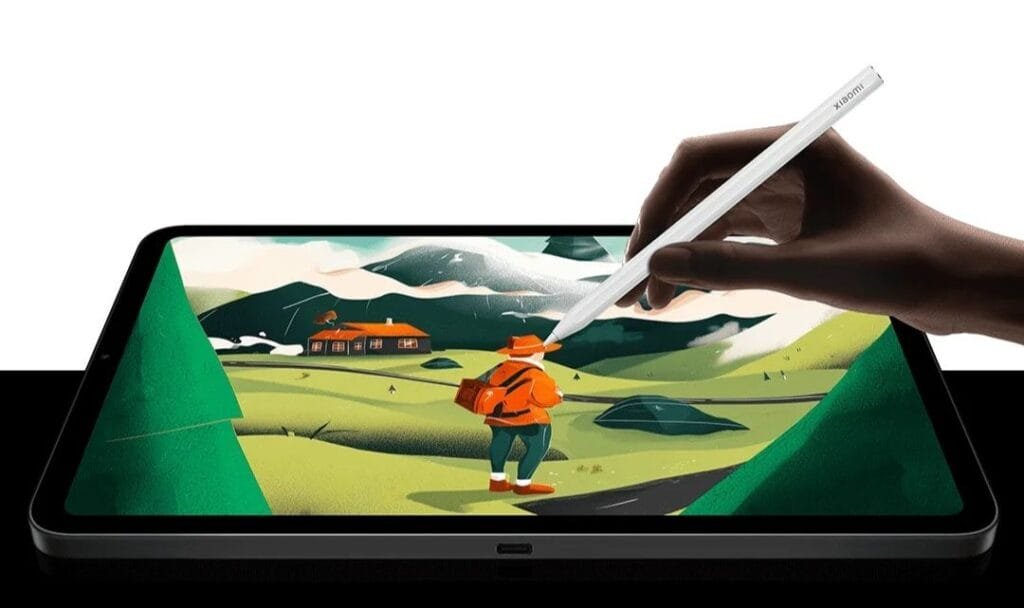 Xiaomi Pad Mini Price in the Philippines Starts at ₱25,999 2 Image of the Xiaomi Pad Mini displaying a drawing app with a hand using a Xiaomi stylus to create a landscape illustration.