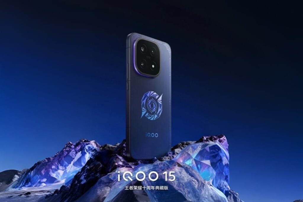 iQOO 15 Honor of Kings 10th Anniversary Collector’s Edition iQOO 15 Honor of Kings Collector's Edition: Phone with blue gradient back, geometric design, quad-camera array, and Honor of Kings logo, displayed on a crystalline surface against a blue background.