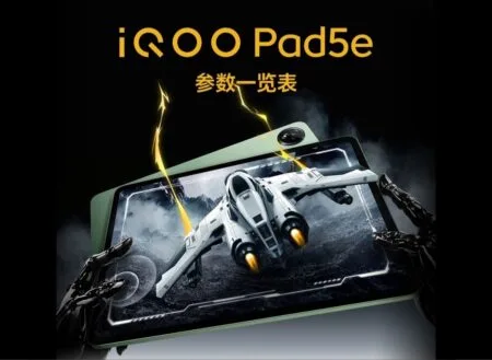 Promotional image of the iQOO Pad 5e, featuring a sleek, light green tablet displaying a high-octane spaceship game, overlaid with the iQOO Pad 5e branding. A dark robotic hand reaches out, enhancing the tablet's immersive gaming experience.