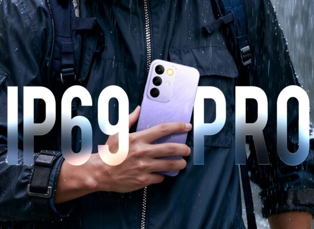 Close-up of the Realme C85 Pro held in a hand, showcasing its IP69 water resistance in rainy conditions.