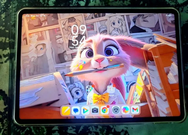 Xiaomi Pad 7 showcasing the HyperOS 3 interface with a custom wallpaper. The lock screen displays the time and date, and the dock features app icons.