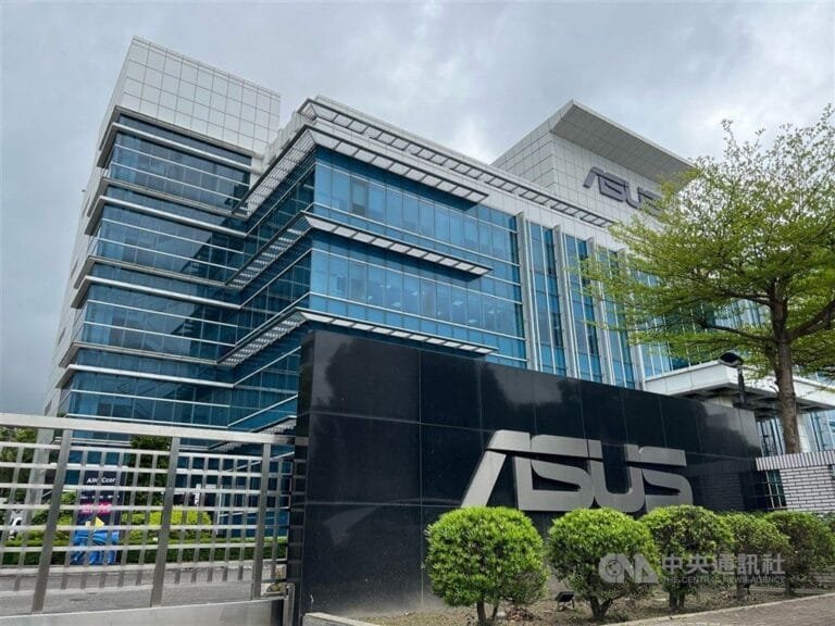 Close-up of the Asus headquarters building, featuring the company logo and modern architecture