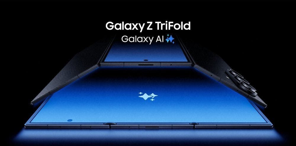 Image of the Samsung Galaxy Z TriFold partially unfolded, displaying its large blue screen and carbon fiber-like texture on the outer panels. The 'Galaxy AI' logo is visible on the screen.