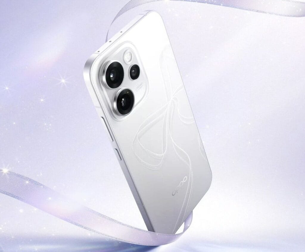 Close-up of the OPPO Reno 15 Pro Mini, highlighting its sleek white design, unique camera arrangement, and subtle back pattern.