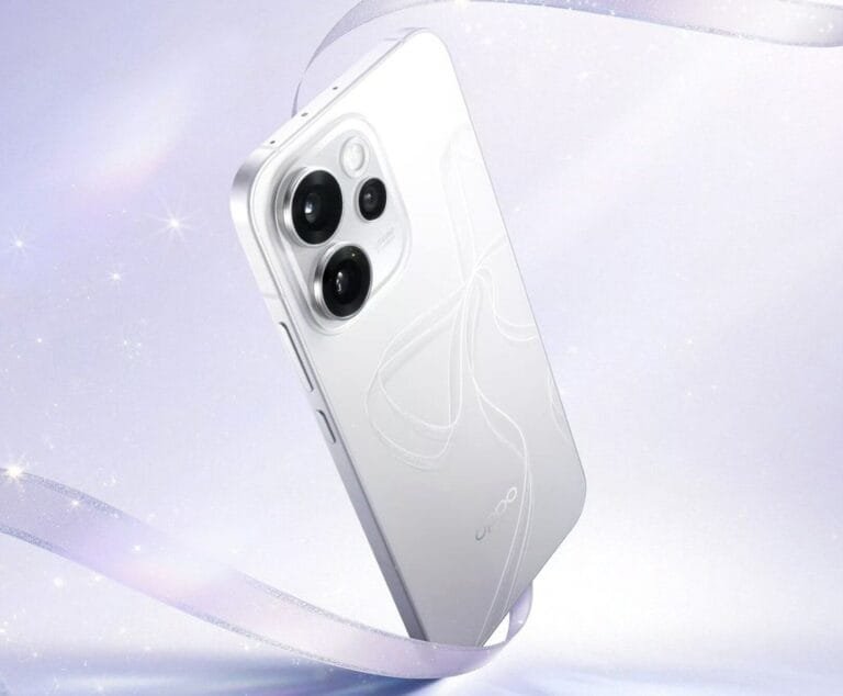 Close-up of the OPPO Reno 15 Pro Mini, highlighting its sleek white design, unique camera arrangement, and subtle back pattern.